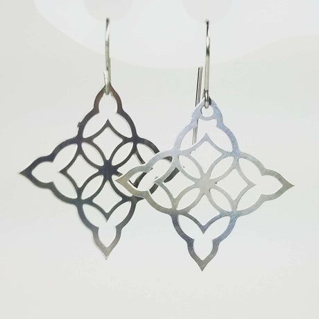 Architectural Steel Earrings with Moorish Flair