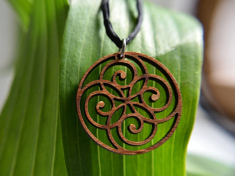 Spiral Circle Pendant in wood on leather cord